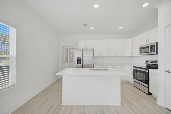 a view of small space with wooden floor