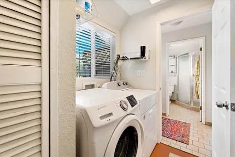 a utility room with dryer and washer