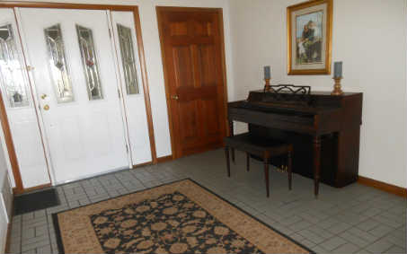 97030 Pirates Point Road Yulee, FL 32097 - Photo 2 of 24 a room with a table and a mirror