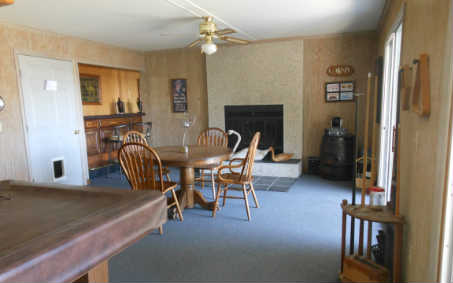 97030 Pirates Point Road Yulee, FL 32097 - Photo 10 of 24 a dining room with furniture and wooden floor
