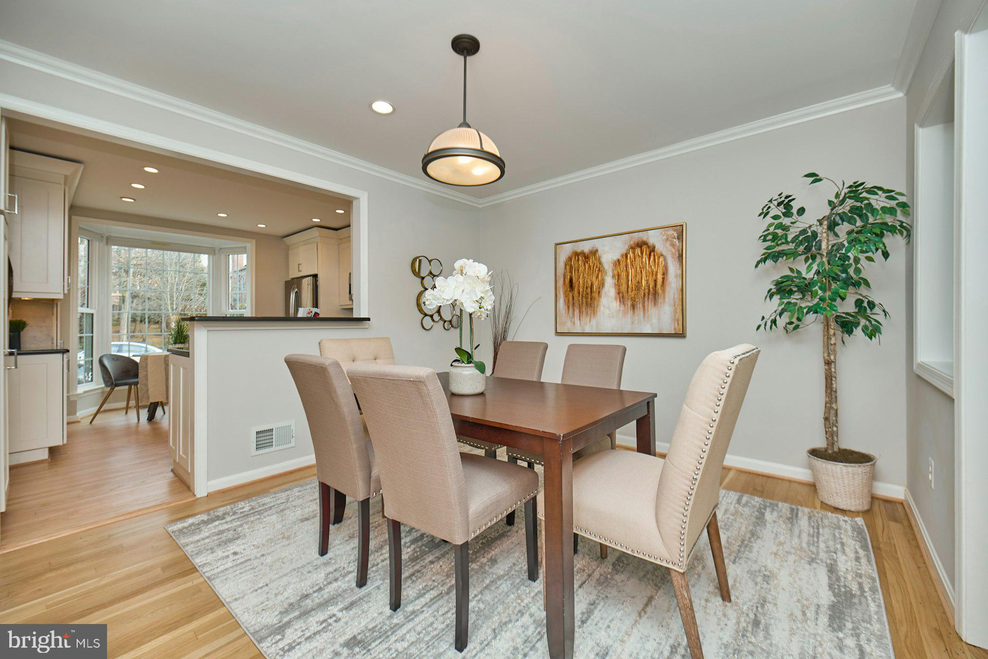 1120 Kensington Road McLean, VA 22101 - Photo 11 of 47 a view of a dining room with furniture and wooden floor