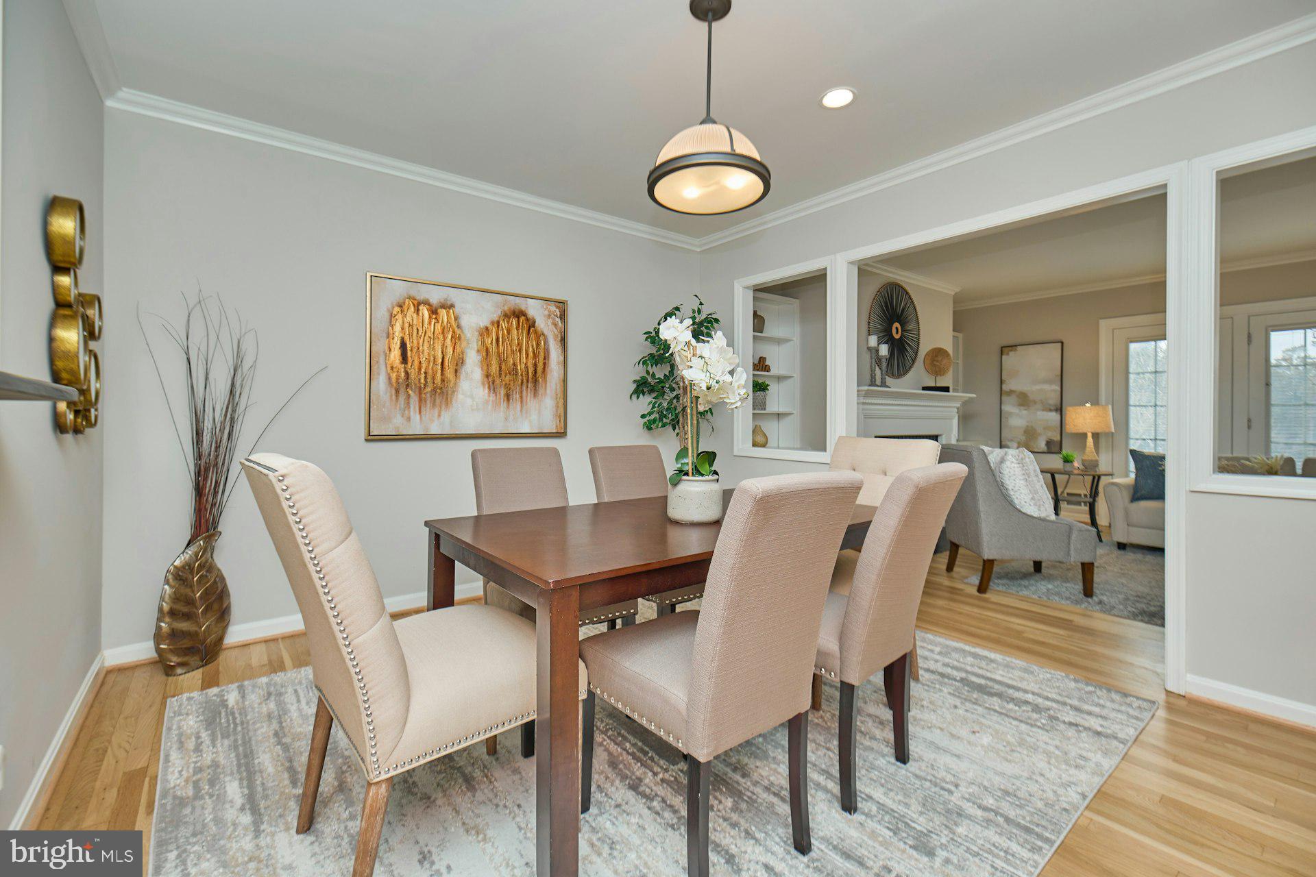 1120 Kensington Road McLean, VA 22101 - Photo 12 of 47 a view of a dining room with furniture and wooden floor