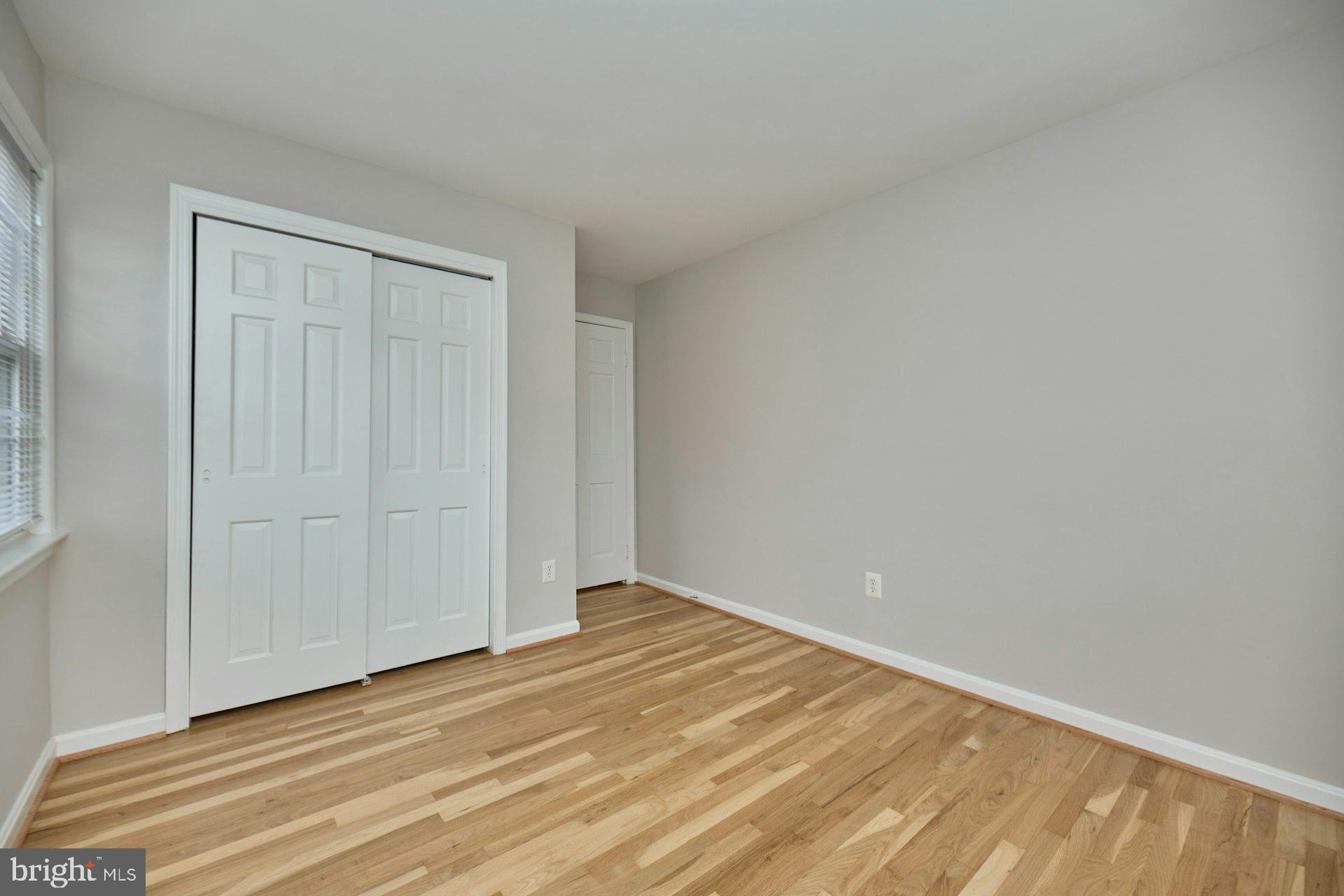 1120 Kensington Road McLean, VA 22101 - Photo 26 of 47 an empty room with wooden floor