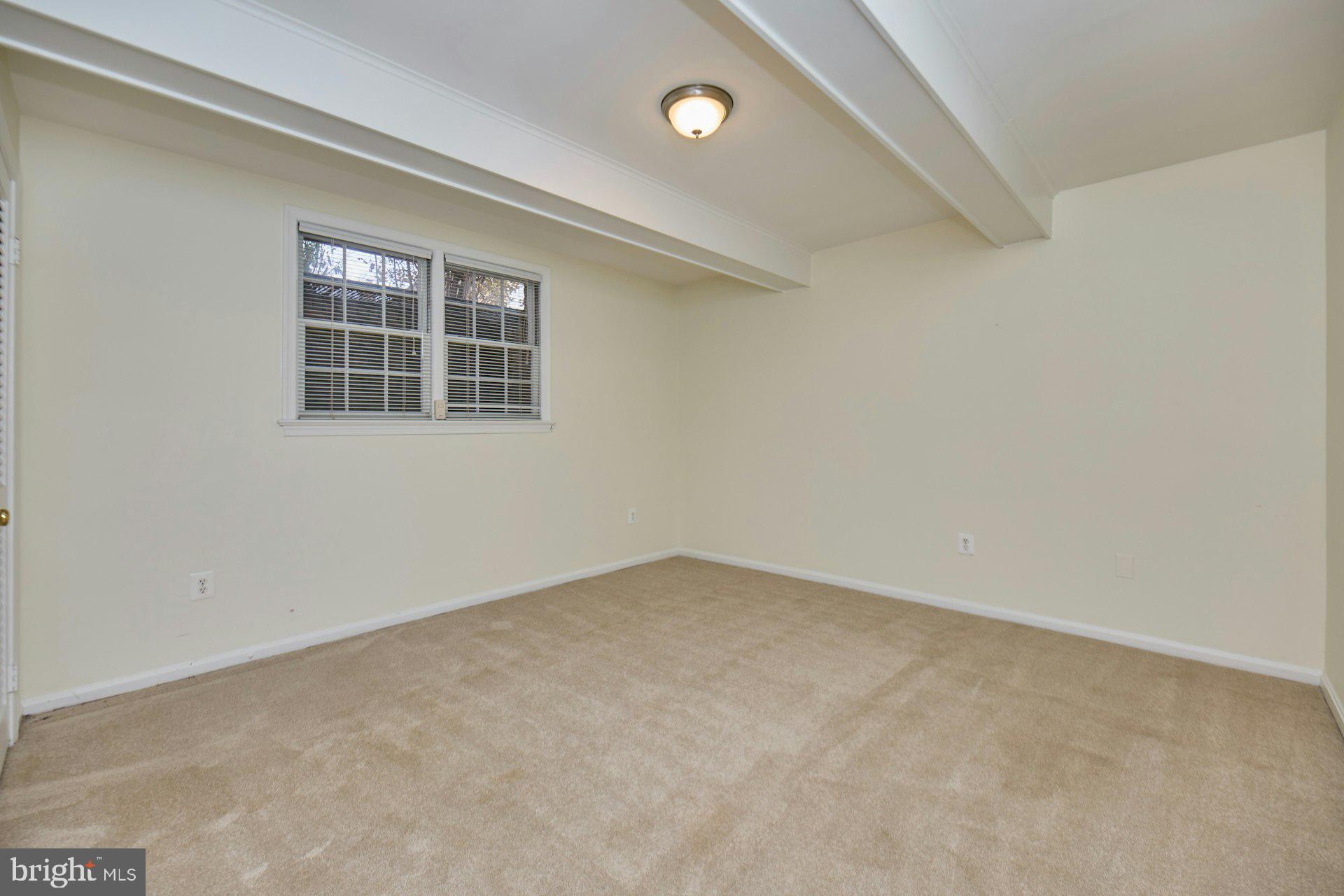 1120 Kensington Road McLean, VA 22101 - Photo 30 of 47 an empty room with windows