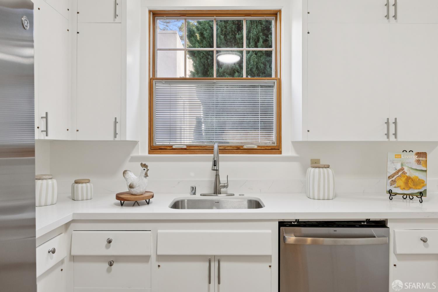 1316 Castillo Avenue Burlingame, CA 94010 - Photo 11 of 33 a kitchen with a sink and cabinets