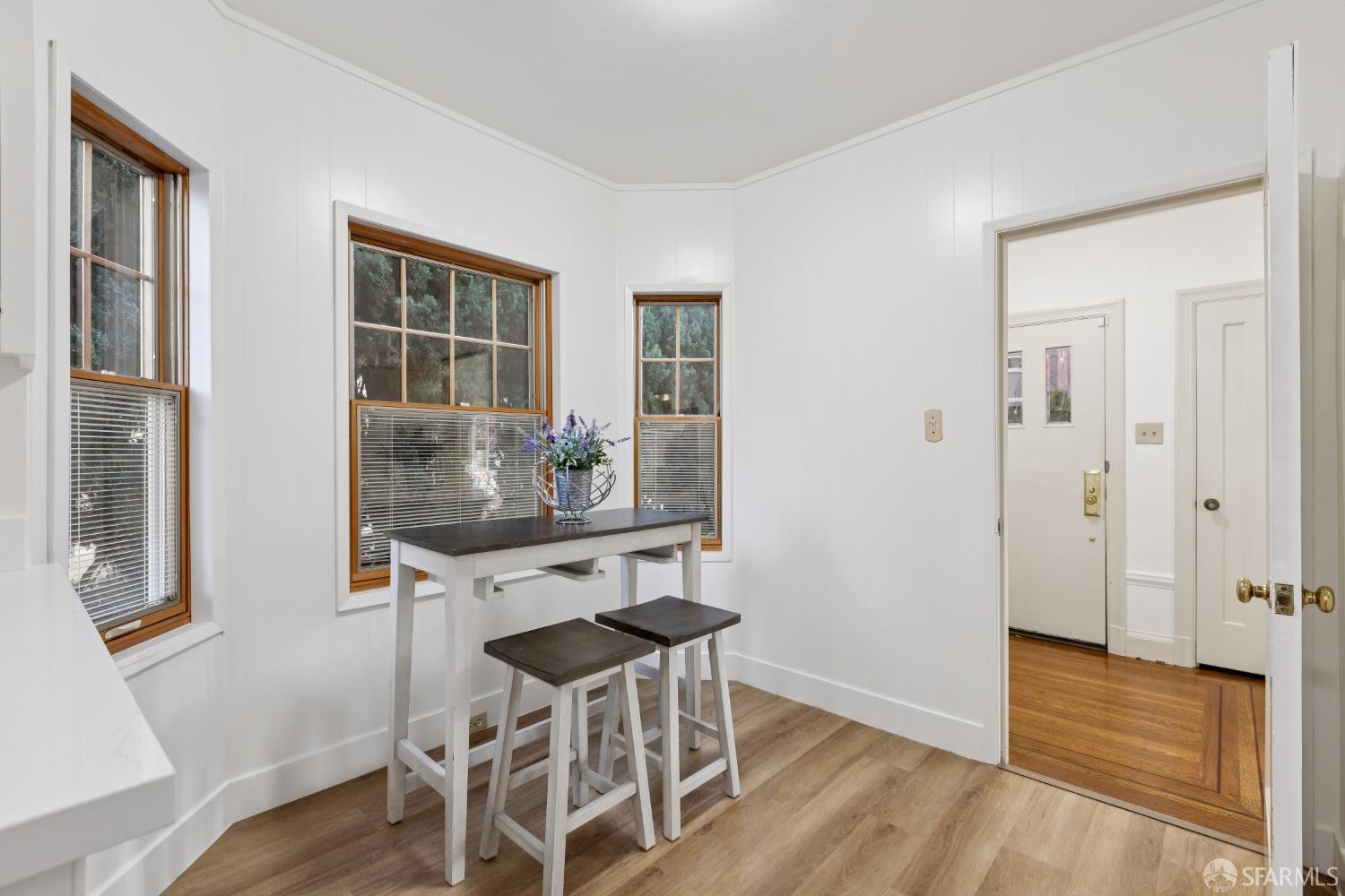 1316 Castillo Avenue Burlingame, CA 94010 - Photo 12 of 33 a view of a dining room with furniture and wooden floor