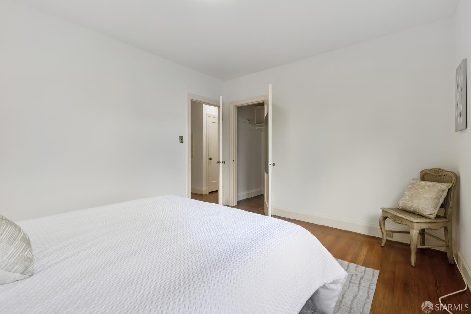 1316 Castillo Avenue Burlingame, CA 94010 - Photo 17 of 33 a bedroom with a bed and chair