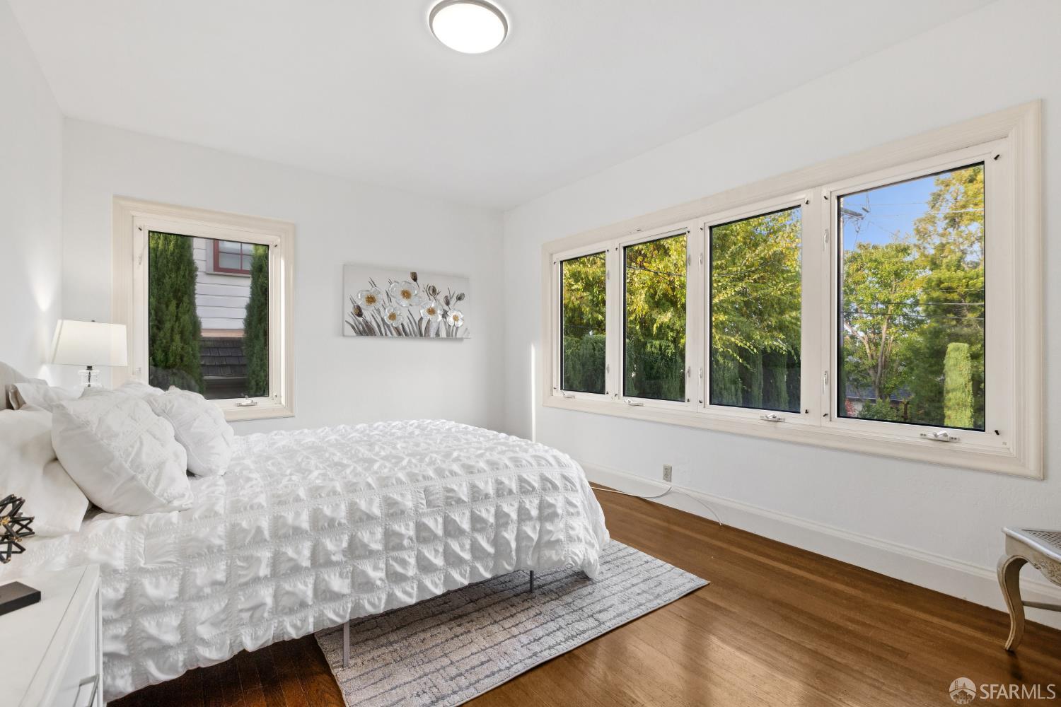 1316 Castillo Avenue Burlingame, CA 94010 - Photo 19 of 33 a bed sitting in a bedroom next to a window
