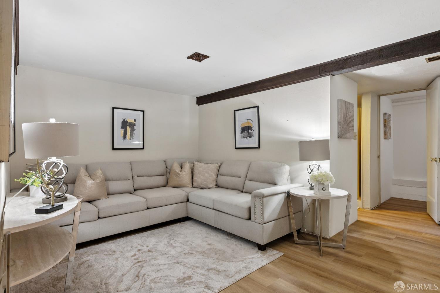 1316 Castillo Avenue Burlingame, CA 94010 - Photo 25 of 33 a living room with furniture and a lamp