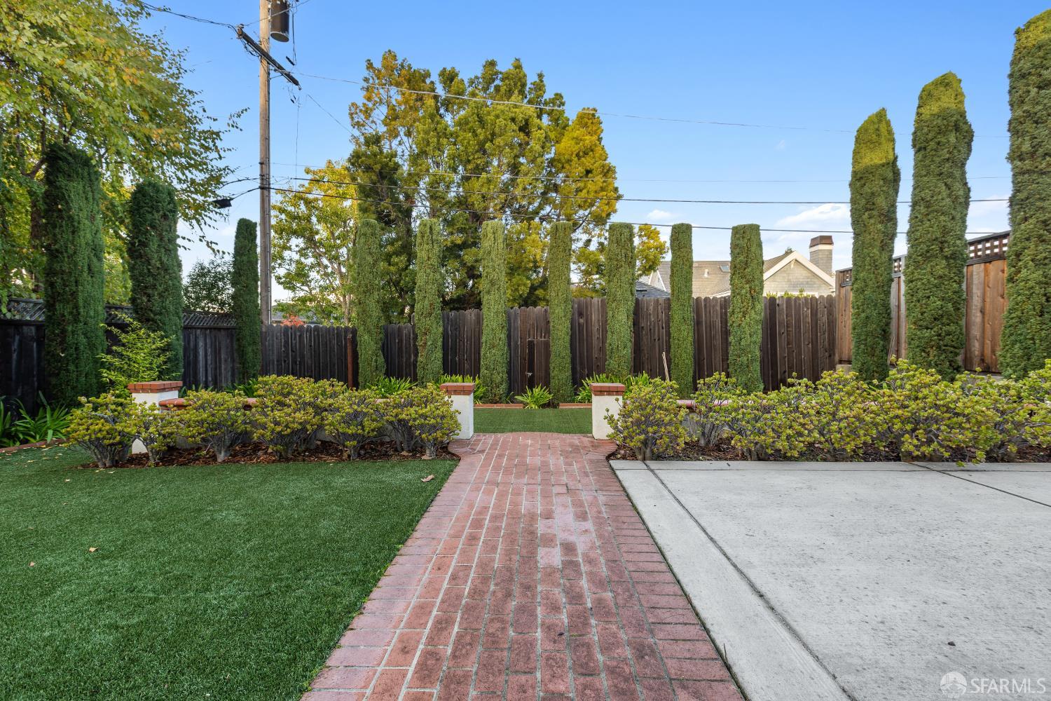 1316 Castillo Avenue Burlingame, CA 94010 - Photo 28 of 33 a view of a garden with a fountain