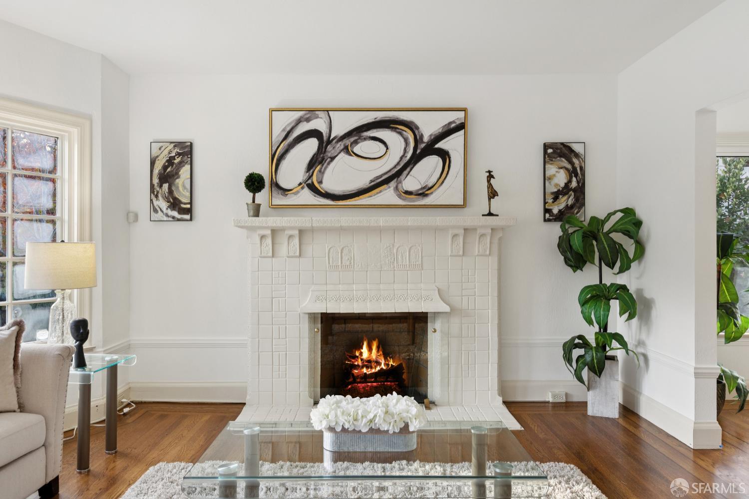 1316 Castillo Avenue Burlingame, CA 94010 - Photo 3 of 33 a living room with a couch and a fireplace
