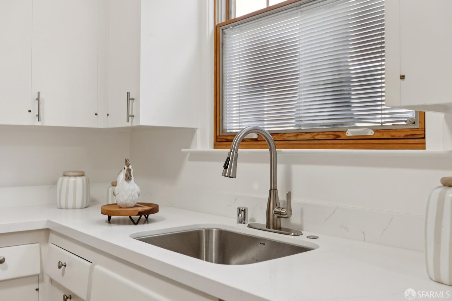 1316 Castillo Avenue Burlingame, CA 94010 - Photo 9 of 33 a kitchen with a sink and a window