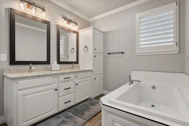 a view of washer and dryer with wooden floor