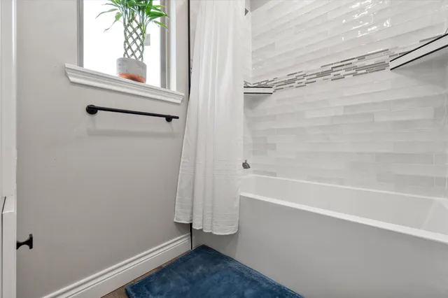 a kitchen with stainless steel appliances a refrigerator and cabinets