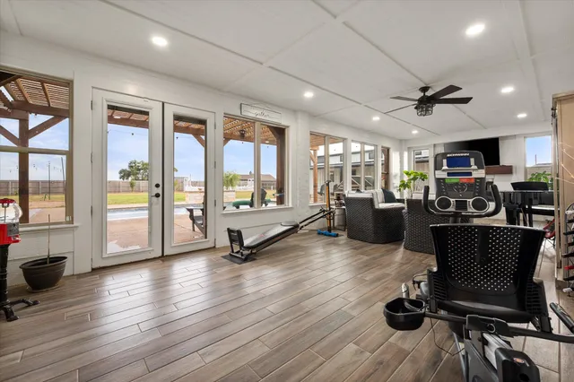 a view of a big house with a yard