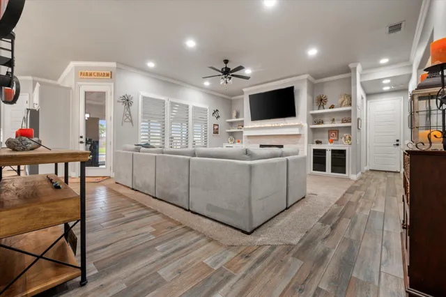 a kitchen with a sink stainless steel appliances and counter space