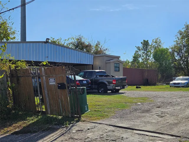 a view of a house and a yard