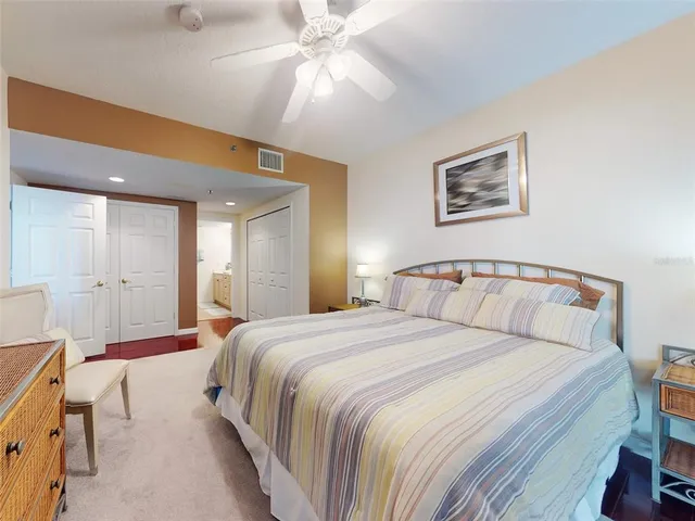 a living room with furniture gym equipment and a window