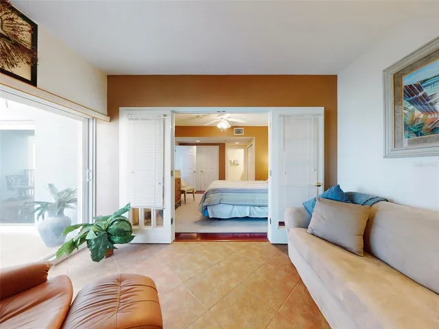a spacious bathroom with a double vanity sink and mirror