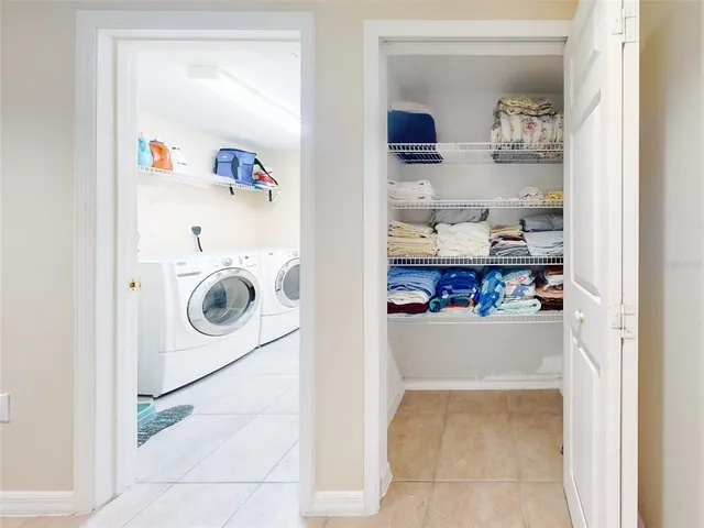 a view of kitchen and cabinets