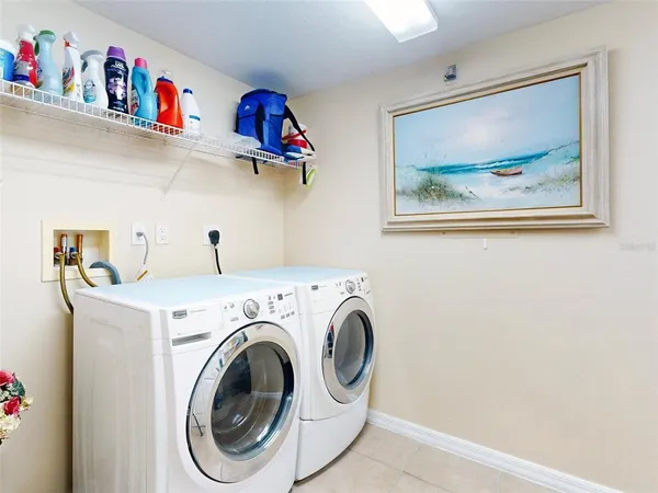 a view of washer and dryer in a utility room