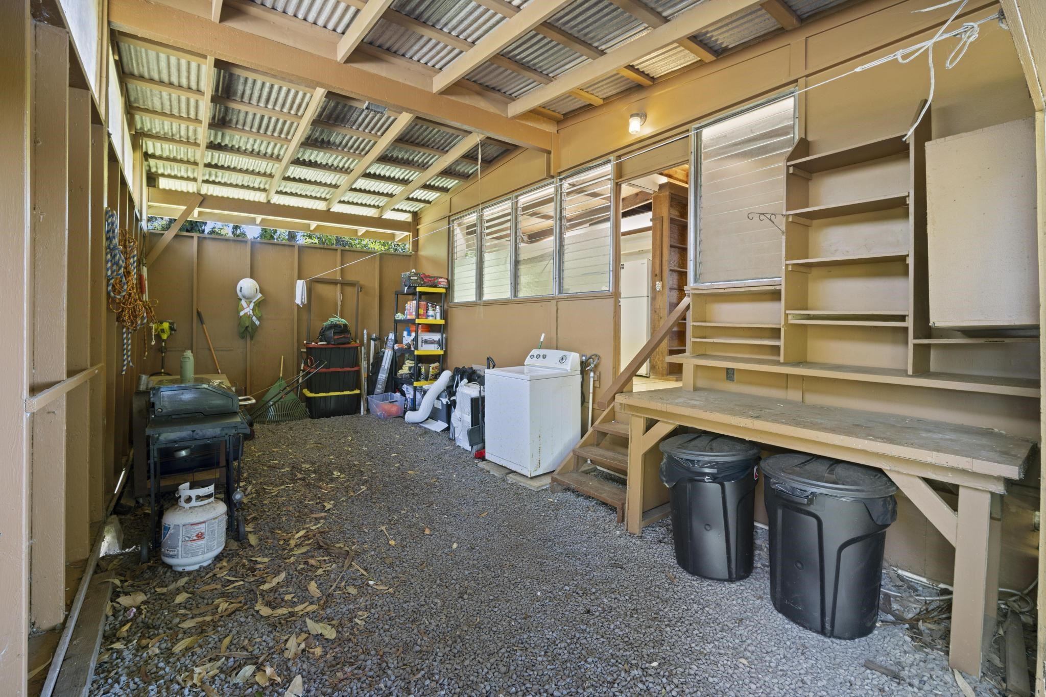 100 East Kuiaha Road Haiku, HI 96708 - Photo 25 of 31 a room with wooden furniture