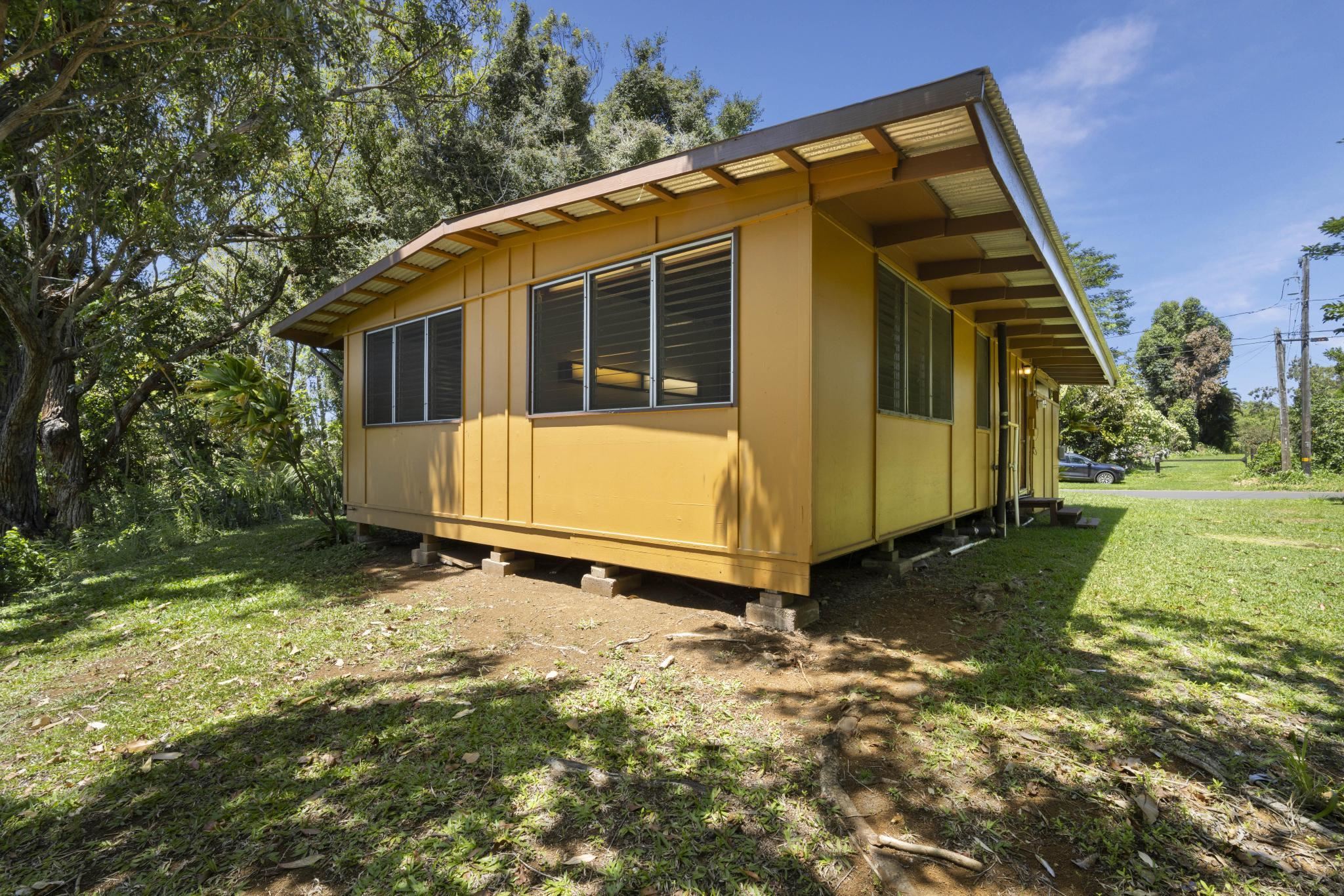 100 East Kuiaha Road Haiku, HI 96708 - Photo 27 of 31 a view of a house with backyard