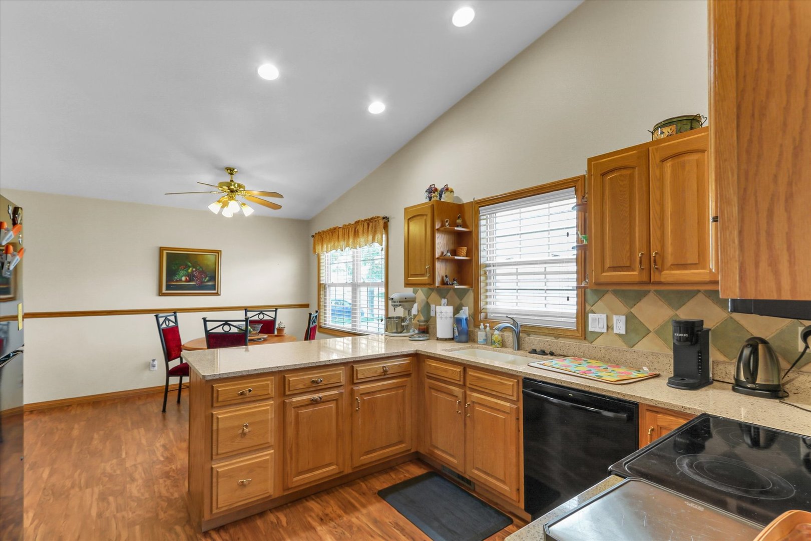 3110 Ridge Park Road Urbana, IL 61802 - Photo 12 of 26 a kitchen with a sink stove and cabinets