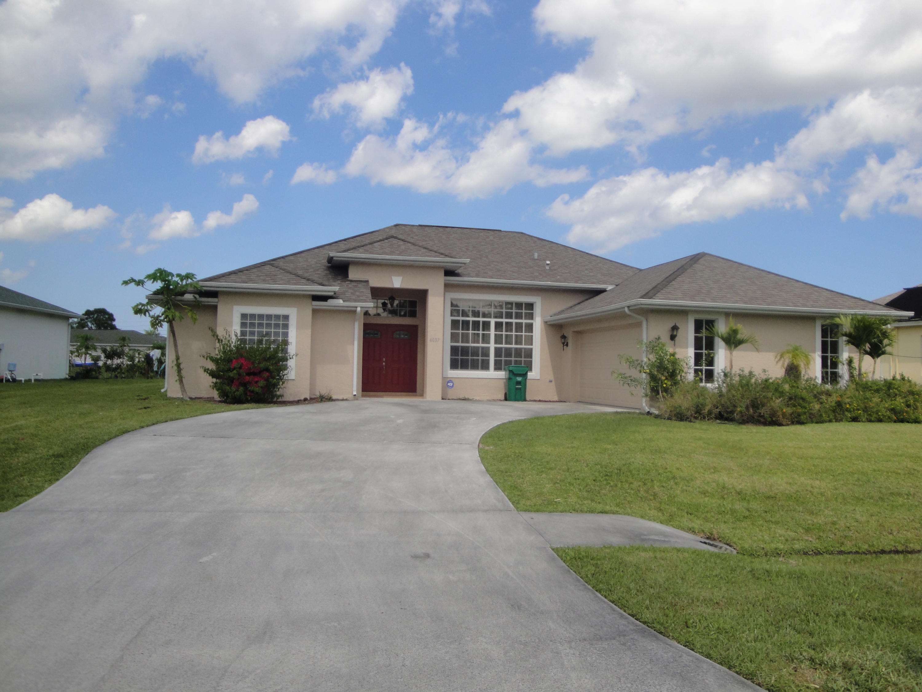 6037 Northwest Wolverine Road Port St. Lucie, FL 34986 - Photo 1 of 16 DSC09449.JPG