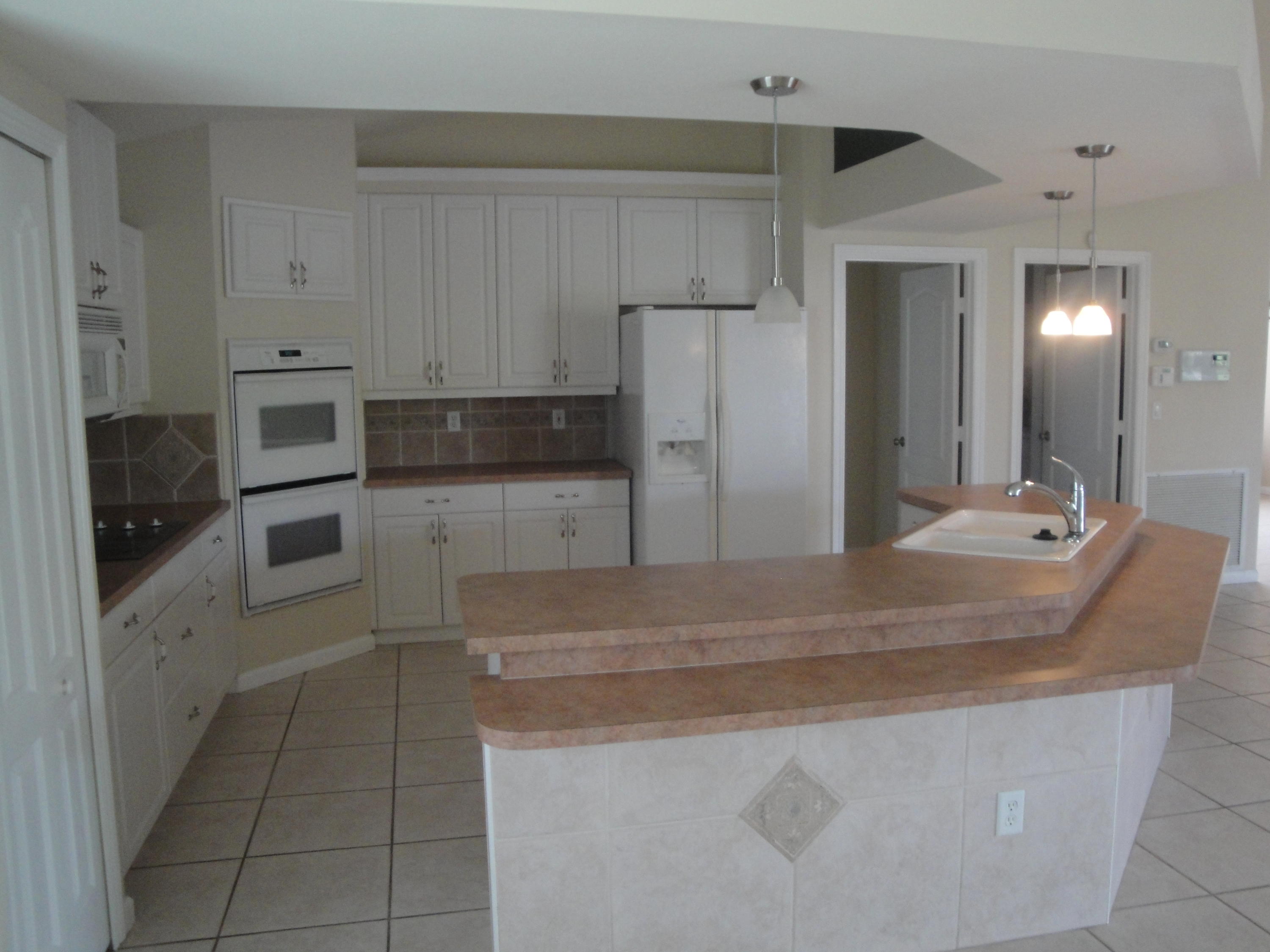 6037 Northwest Wolverine Road Port St. Lucie, FL 34986 - Photo 5 of 16 DSC09451.JPG