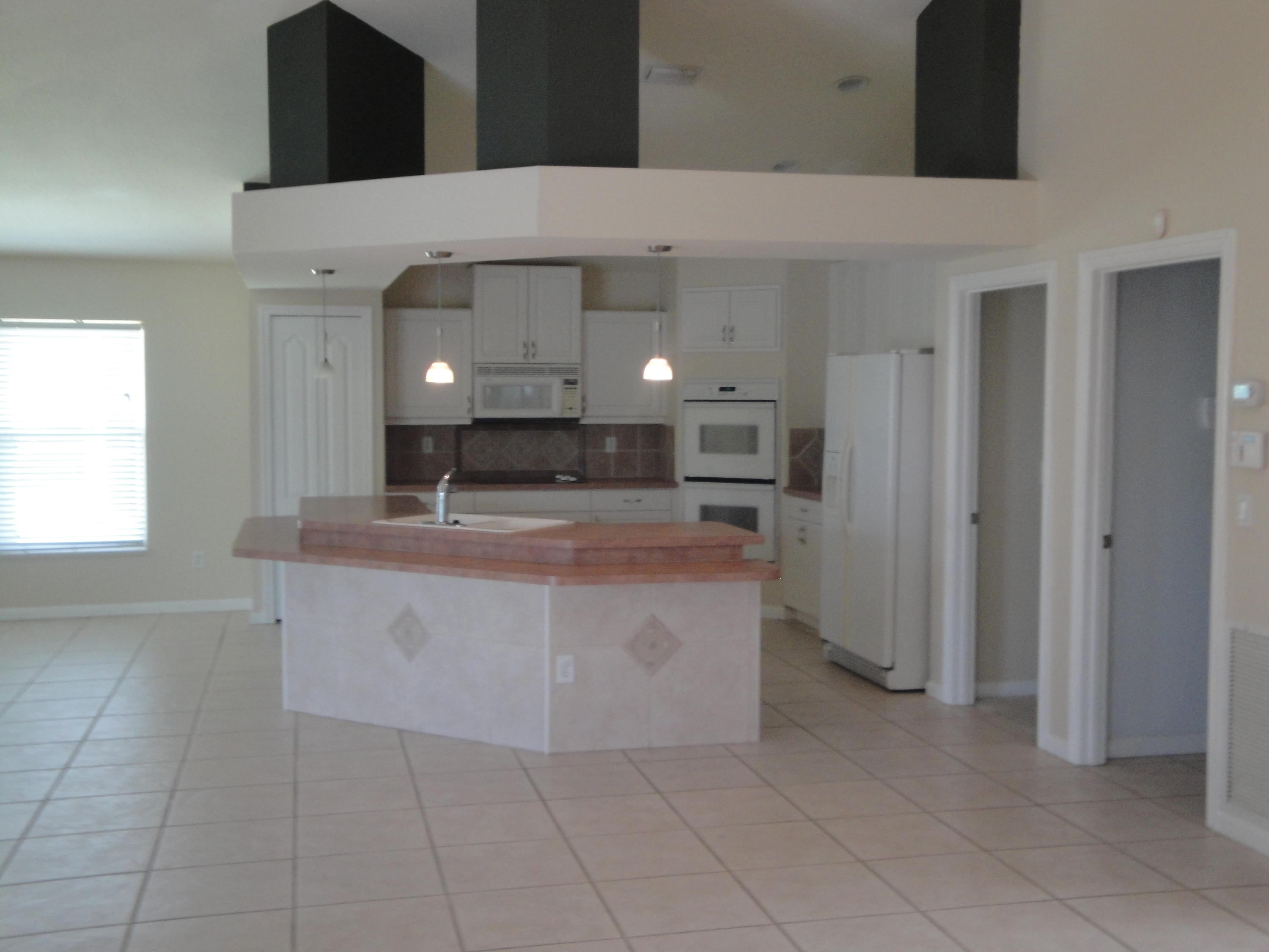 6037 Northwest Wolverine Road Port St. Lucie, FL 34986 - Photo 7 of 16 DSC09453.JPG
