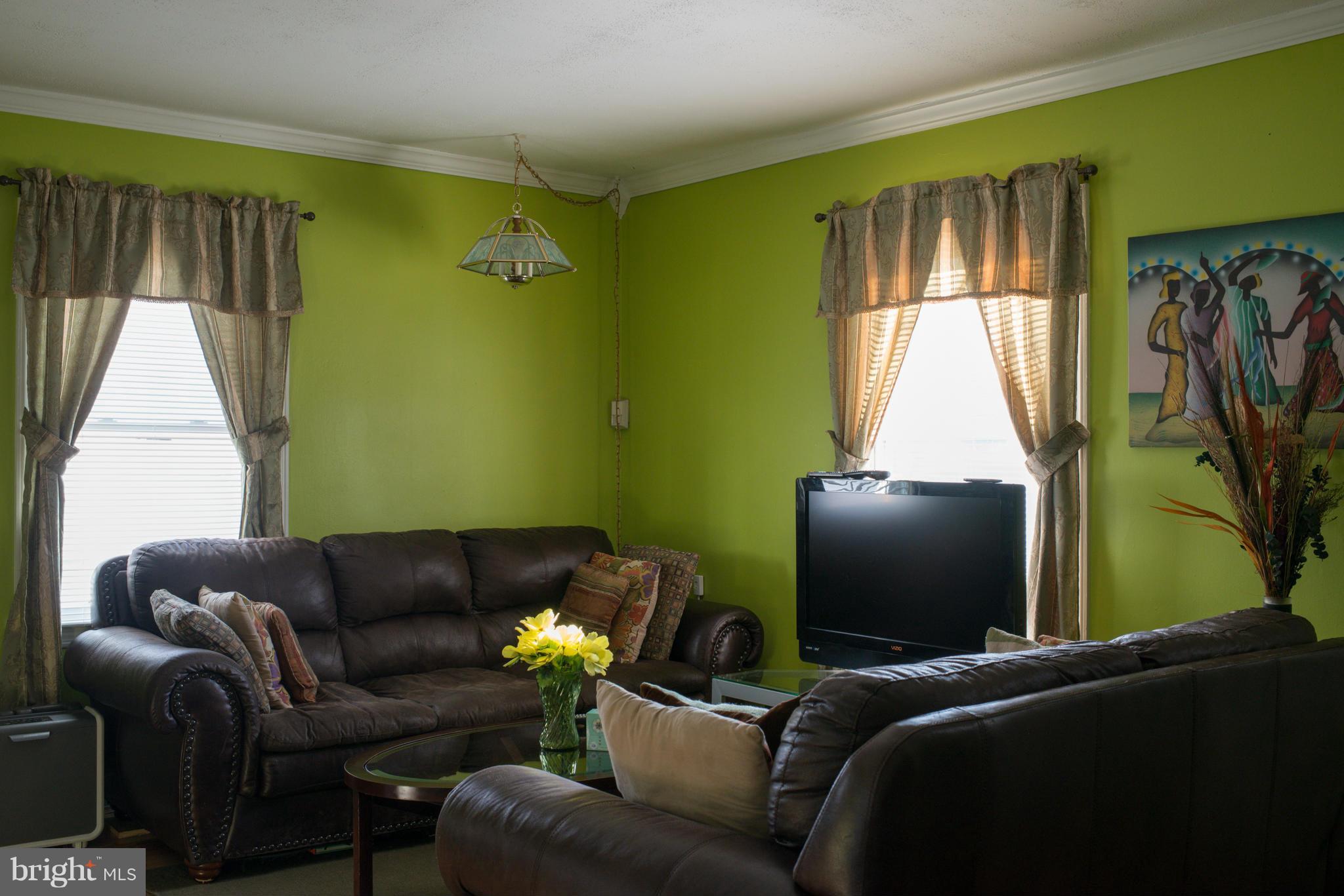 5314 Overhill Road Baltimore, MD 21207 - Photo 6 of 14 a living room with furniture and a window