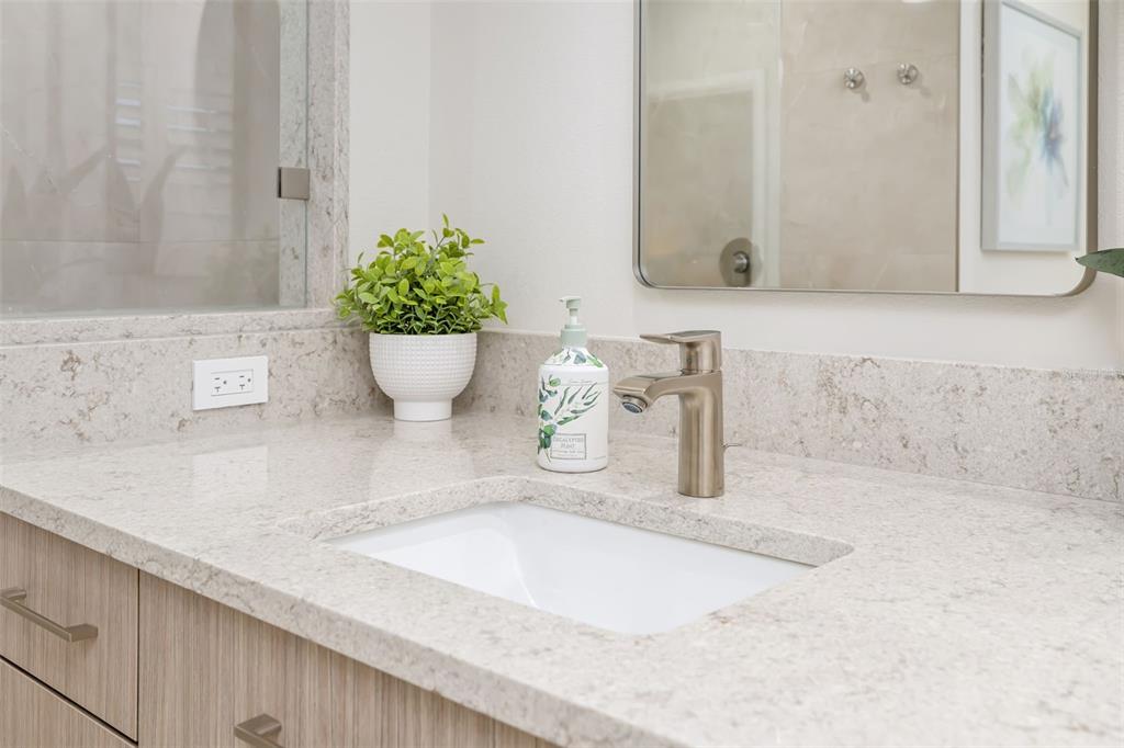 480 Cleveland Drive Sarasota, FL 34236 - Photo 37 of 95 a bathroom with a granite countertop sink and a mirror