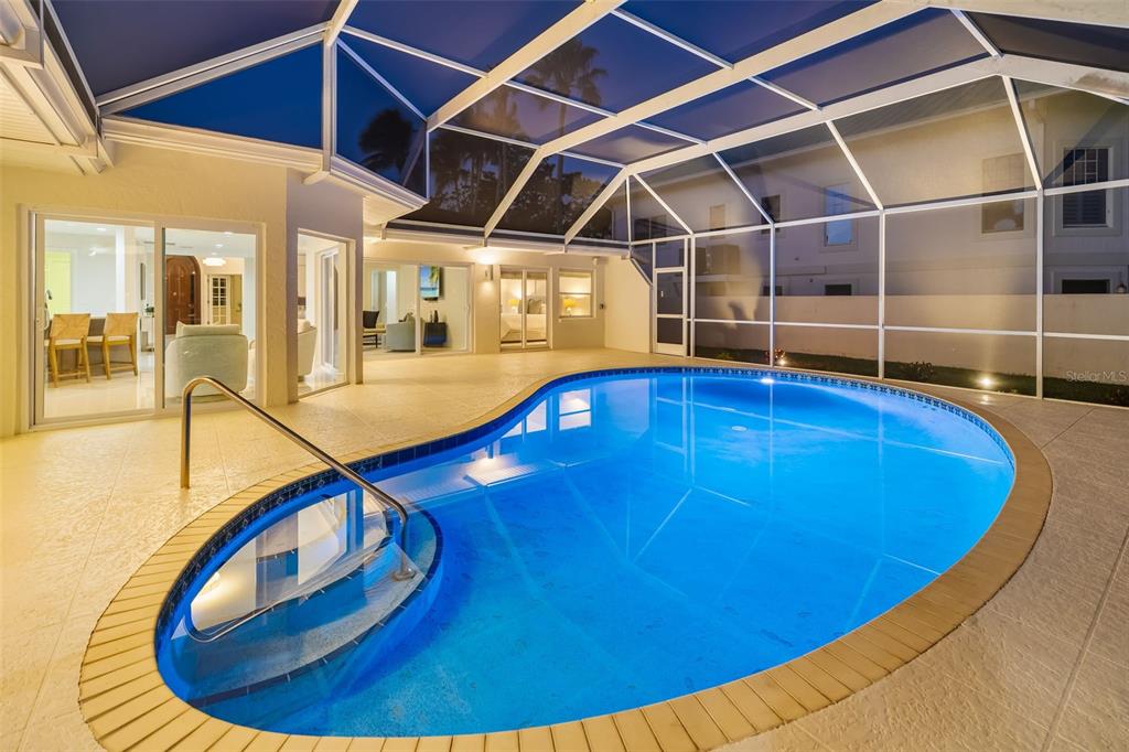 480 Cleveland Drive Sarasota, FL 34236 - Photo 5 of 95 a view of a swimming pool with wooden deck