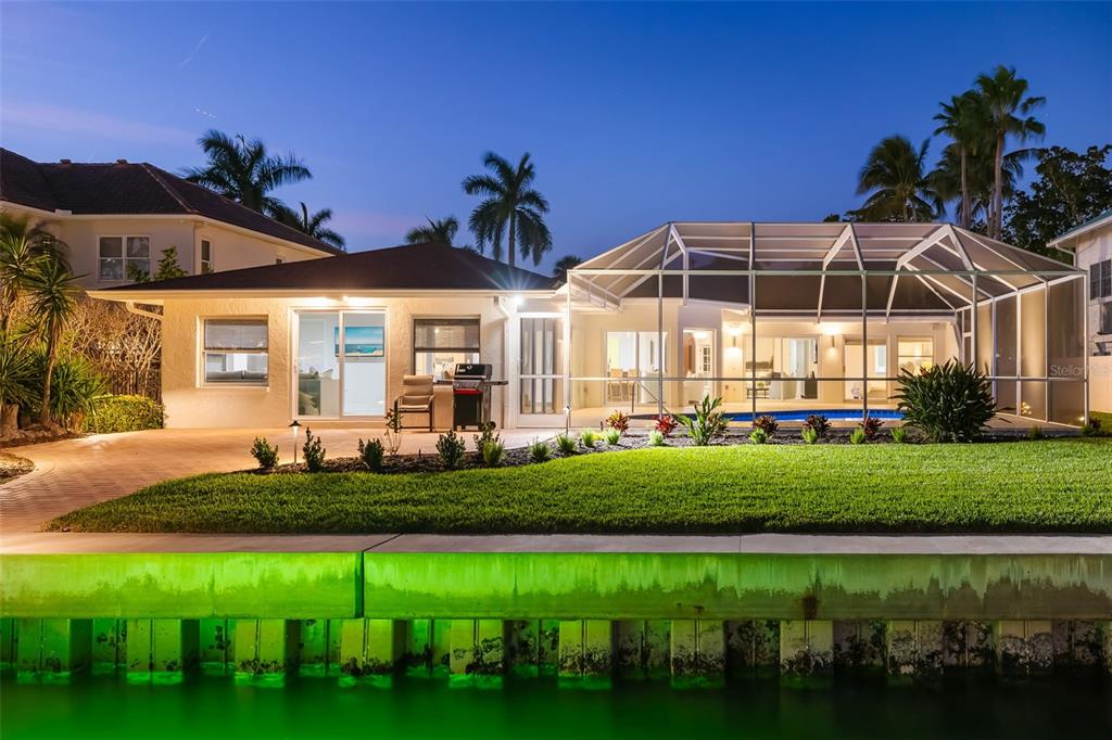 480 Cleveland Drive Sarasota, FL 34236 - Photo 6 of 95 a front view of a house with a garden