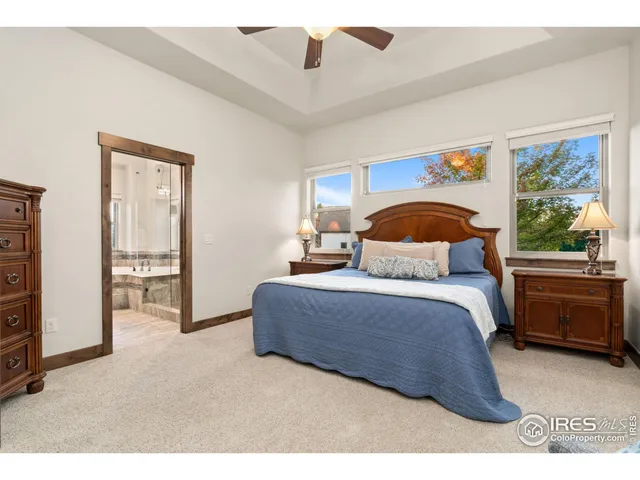 a bedroom with a bed and a cabinets