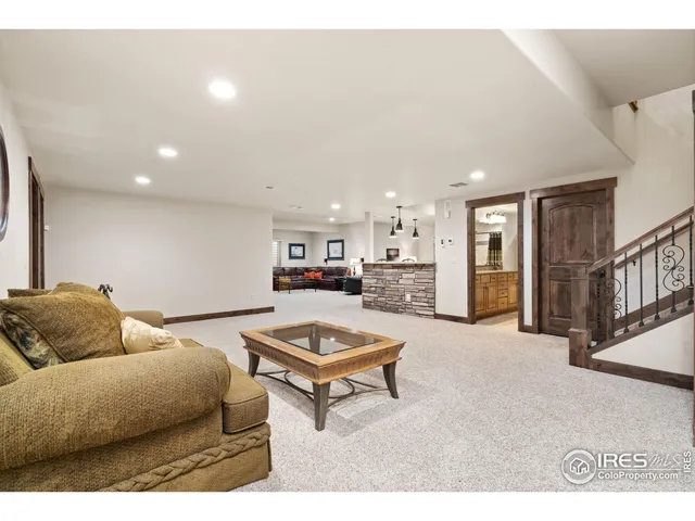 a living room with furniture and a table