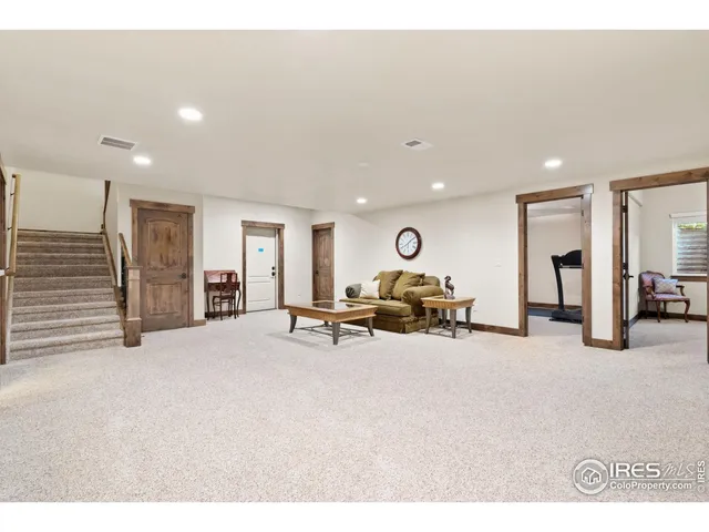 a view of a livingroom with furniture and a couch