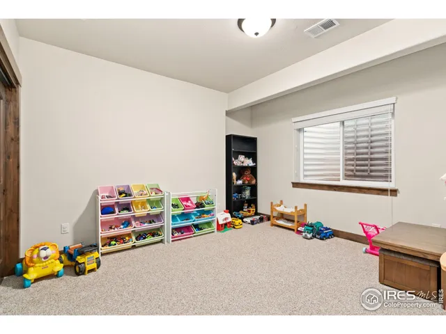 a bedroom with toys and toys