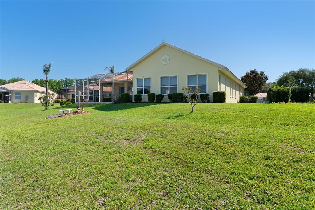 10081 Georgetown Court Weeki Wachee, FL 34613 - Photo 56 of 76 a front view of a house with a yard