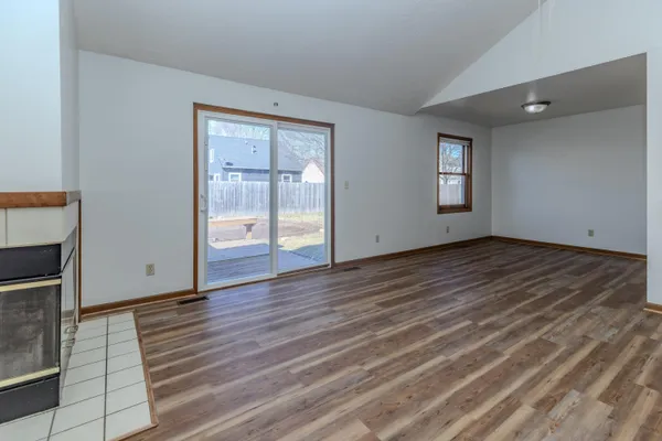 a kitchen with a stove and a refrigerator