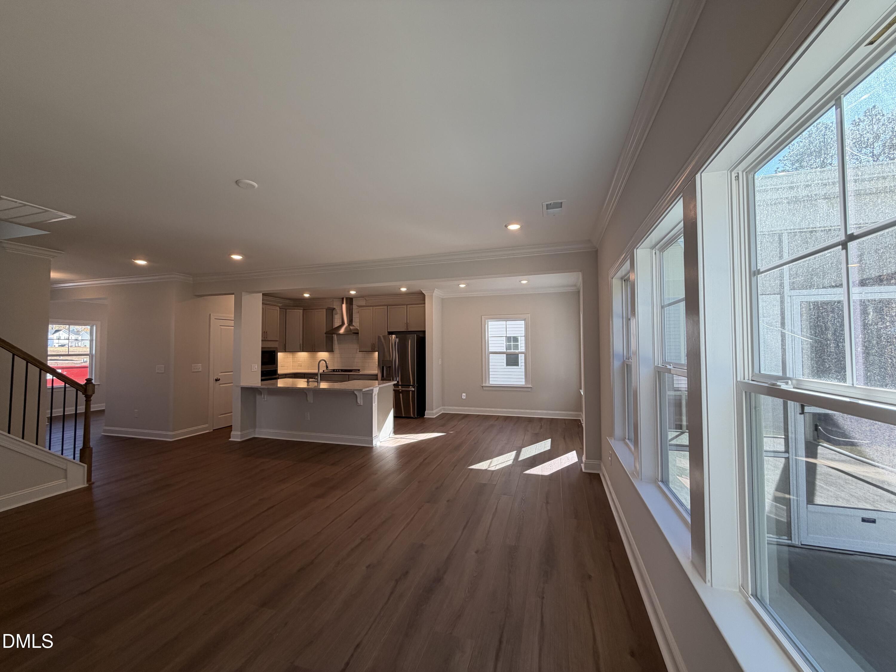 1100 Red Roses Avenue Durham, NC 27703 - Photo 11 of 51 a view of dining room with furniture wooden floor and window