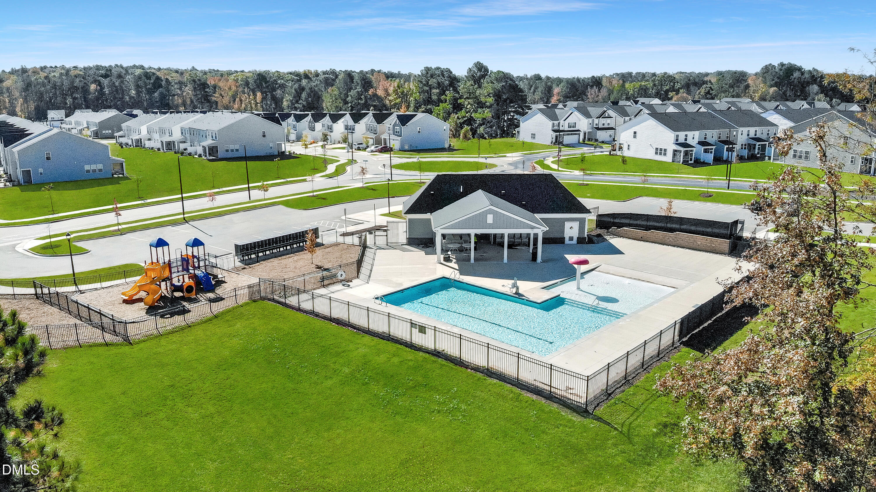 1100 Red Roses Avenue Durham, NC 27703 - Photo 49 of 51 an aerial view of a house with a garden and lake view