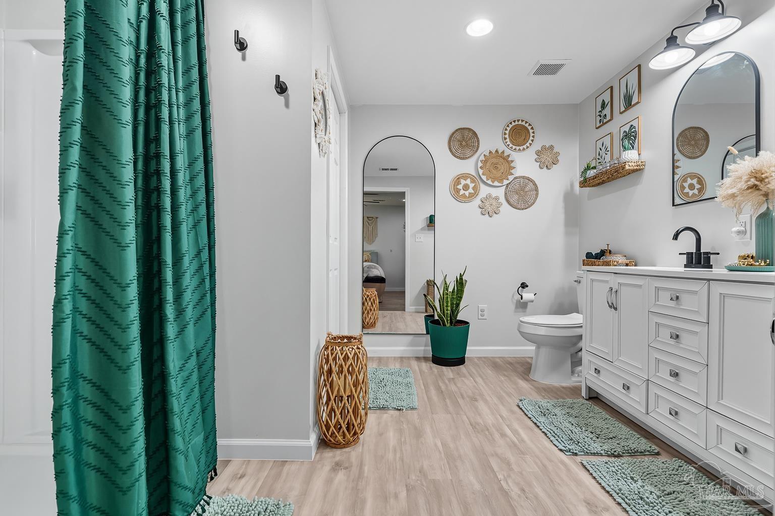 2436 Renfroe Road Pace, FL 32571 - Photo 23 of 45 a view of a hallway to a livingroom with furniture