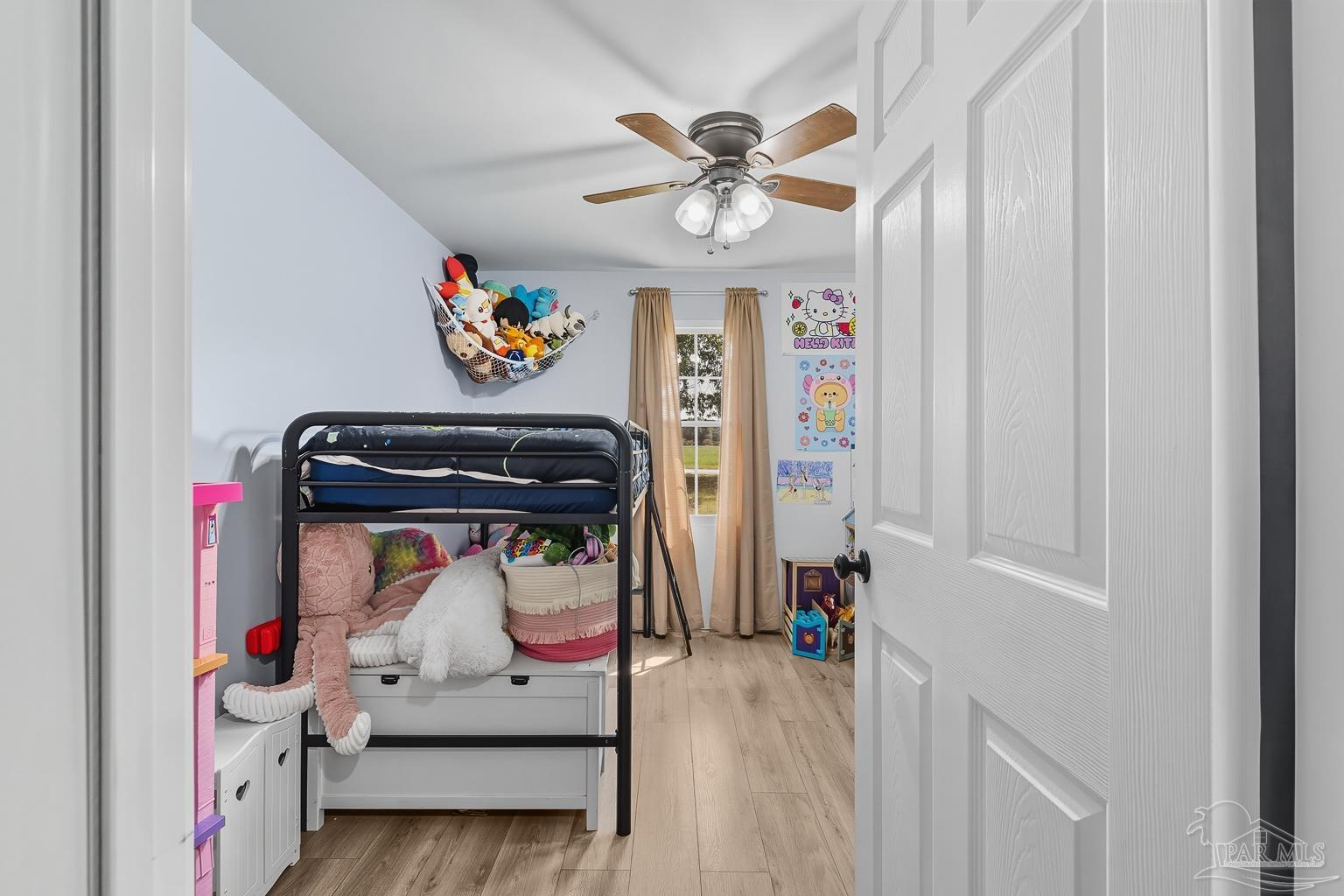 2436 Renfroe Road Pace, FL 32571 - Photo 28 of 45 a view of an entryway with wooden floor