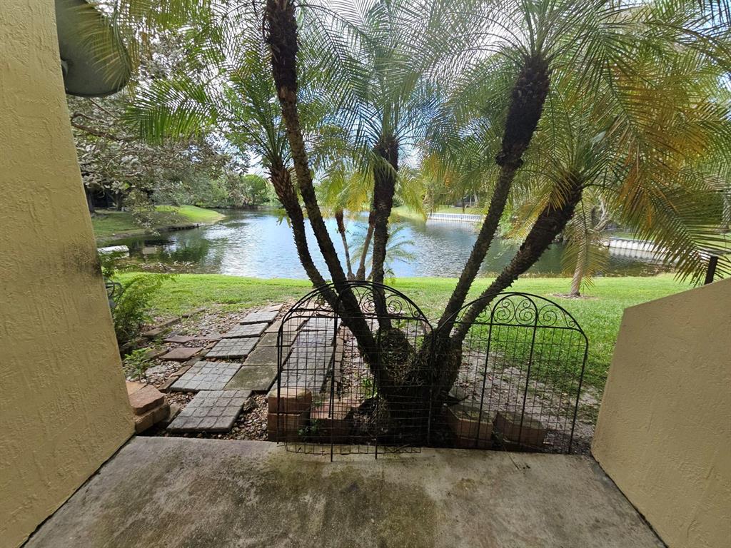 6185 Laurel Lane, Unit B Tamarac, FL 33319 - Photo 2 of 12 a view of outdoor space and entertaining space