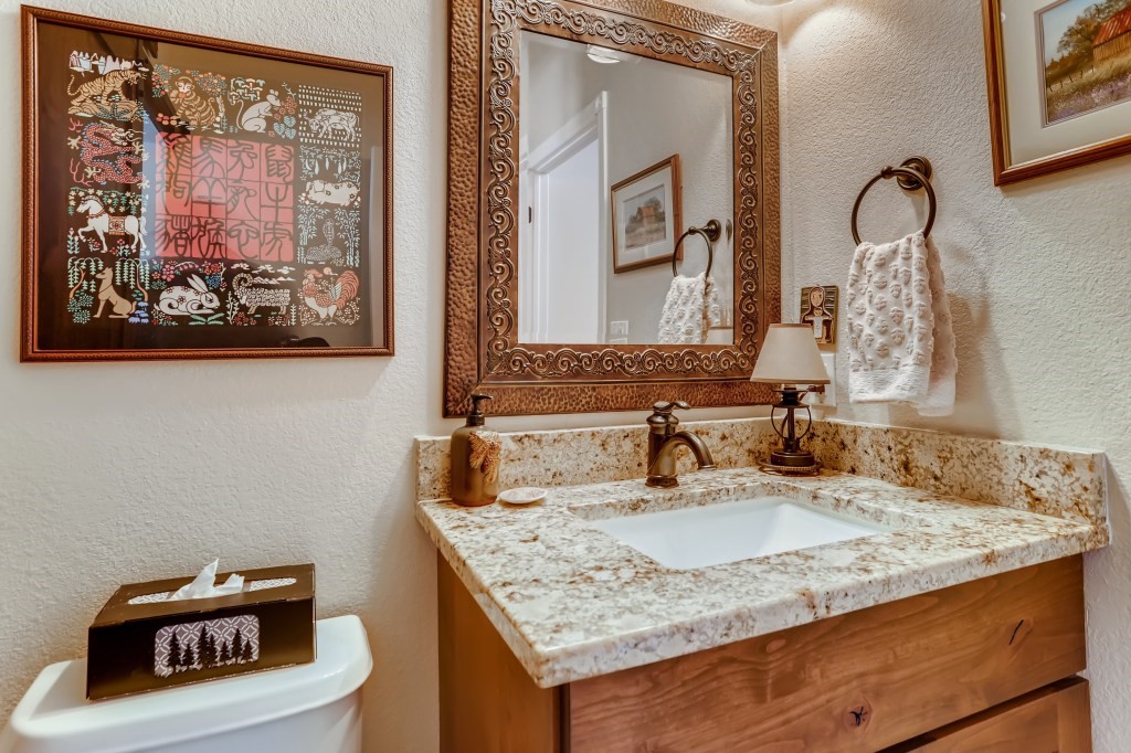 98 Lookout Ridge Drive, Unit 98 Dillon, CO 80435 - Photo 14 of 29 HALF BATHROOM on the main living level...
