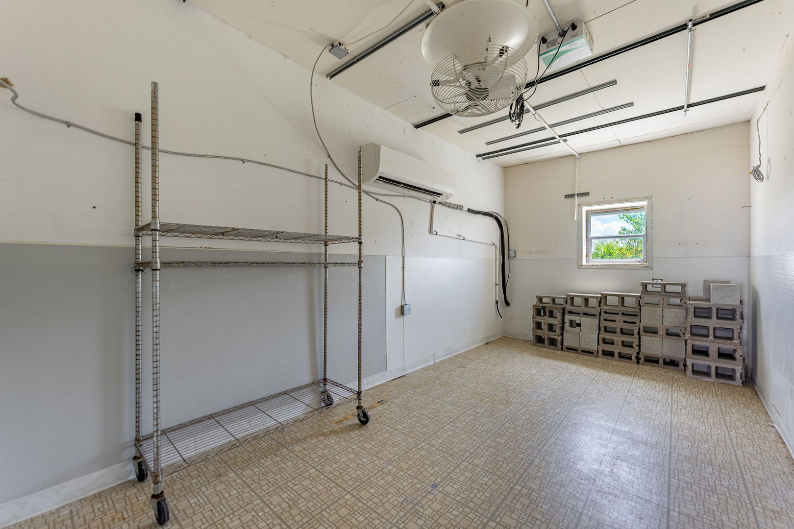 7496 Wolf Road Kingston, IL 60145 - Photo 6 of 15 a view of an empty room with a window