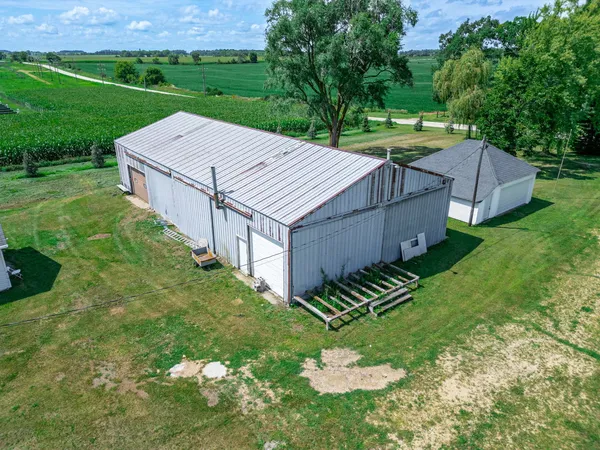 a view of a back yard of the house