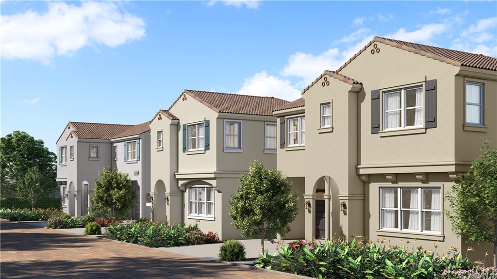 6514 Alondra Boulevard Paramount, CA 90723 - Photo 9 of 10 a front view of a house with a yard